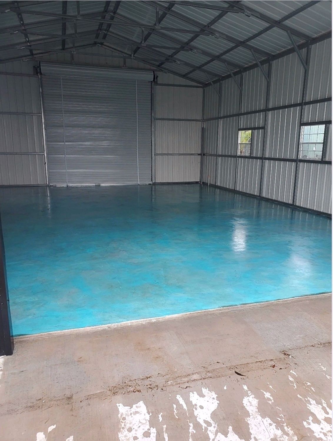 Teal epoxy floor commercial building